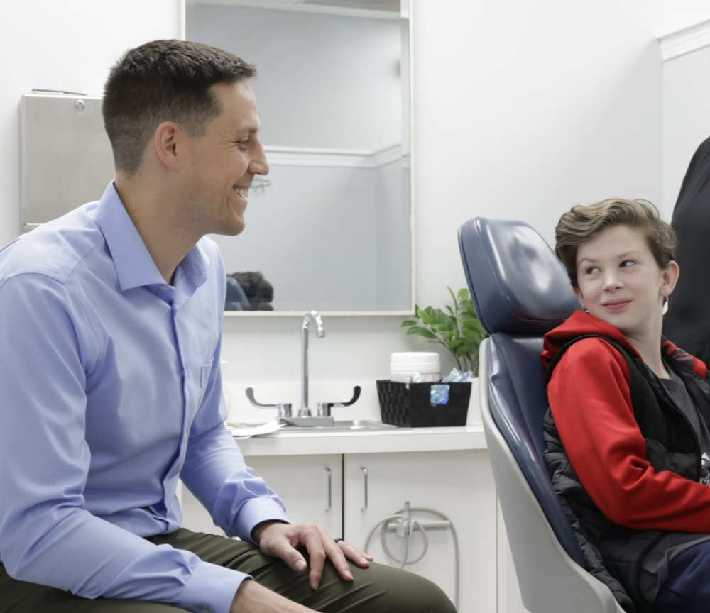 patient laughing with doctor